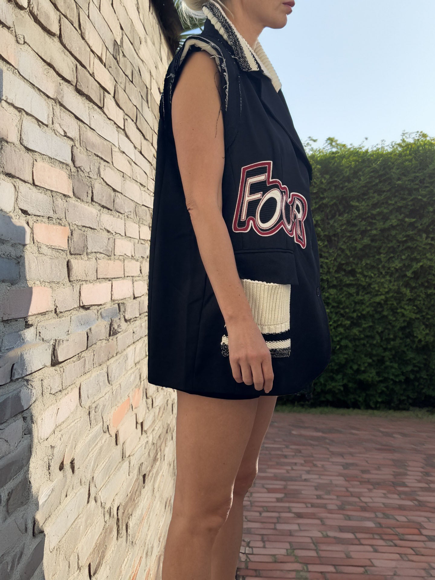 Women's Black Vest cut edge with emblem