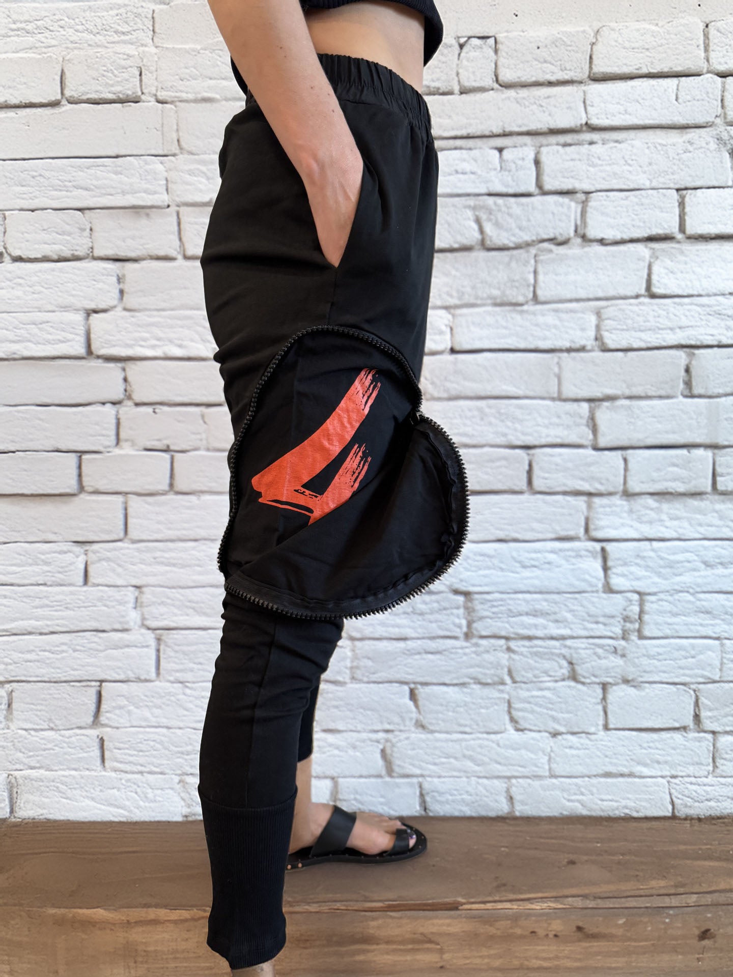 Women's Black Baggy Comfortable Zipper Pockets Pants Orange Emblem